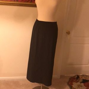 Long gray skirt with slit in back.
